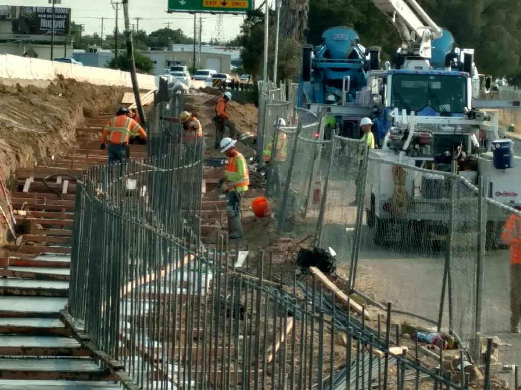 Workers are working on a construction site.