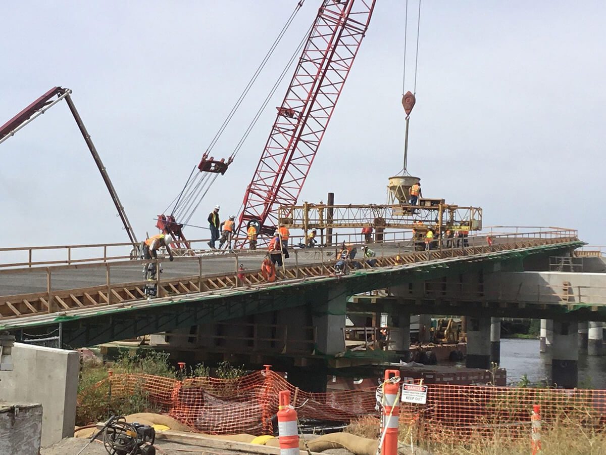 A construction site with cranes and machines