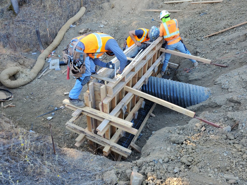 A group of men working on a construction site.