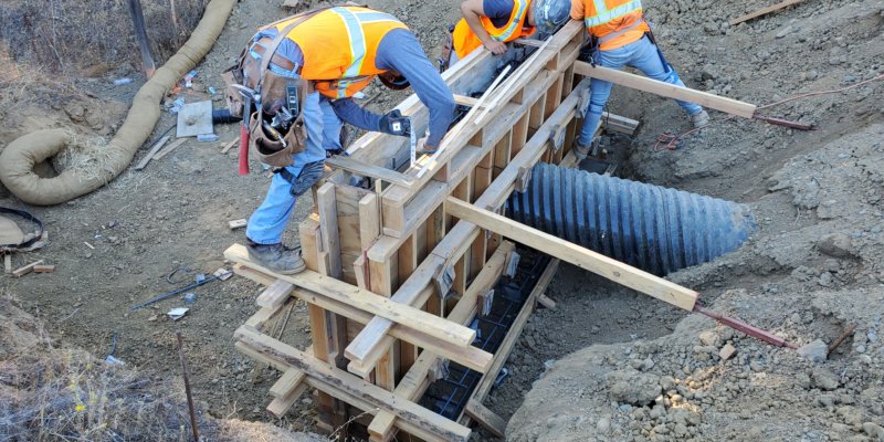 A group of men working on a construction site.