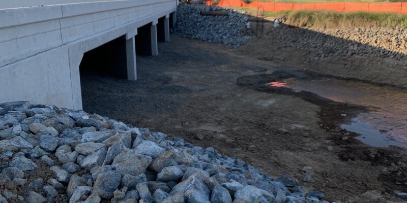 A road with rocks and gravel under it