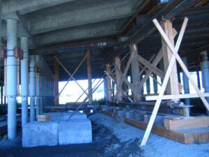 A building under construction with wooden beams.